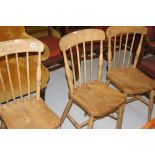 20th cent. Oak and elm stick back kitchen chairs. (4)