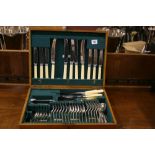 20th cent. Cutlery: Oak cased canteen of cutlery.