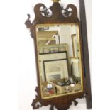 19th cent Mahogany framed bevel edged mirror, shaped & carved frame. 14ins. x 21½ins.