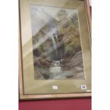 E K McCallum, watercolour on paper of a waterfall.  Framed and glazed, 11ins. x 16ins.