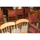 Early 20th cent: Oak dining chairs 4 plus 2 carvers red leatherette seats and backs.