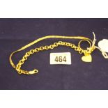 Jewellery: Yellow metal marked 375 chain bracelet with padlock, a plated bracelet plus a
