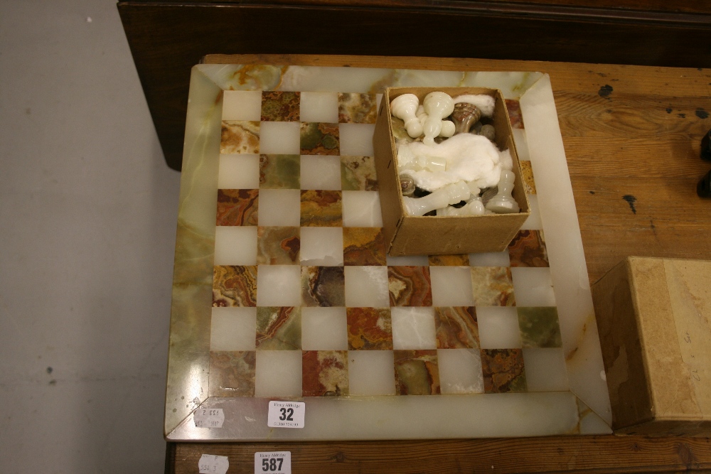 20th cent. Onyx chess board & chess set.