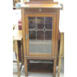 Mahogany display cabinet single door with stained glass decoration. 23ins.