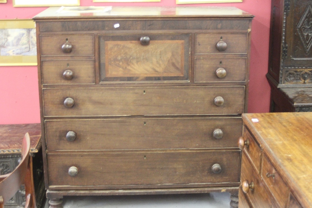 19th cent. Mahogany banded Scottish chest of drawers with a central hat drawer flanked by 2