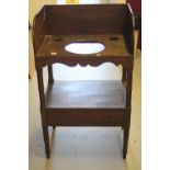 Early 19th cent. Mahogany washstand on turned tapering supports.