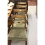 19th cent. Upholstered oak dining chairs with bar backs and sabre supports (4).