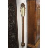 Early 20th cent. oak stick barometer with carved foliate decoration.