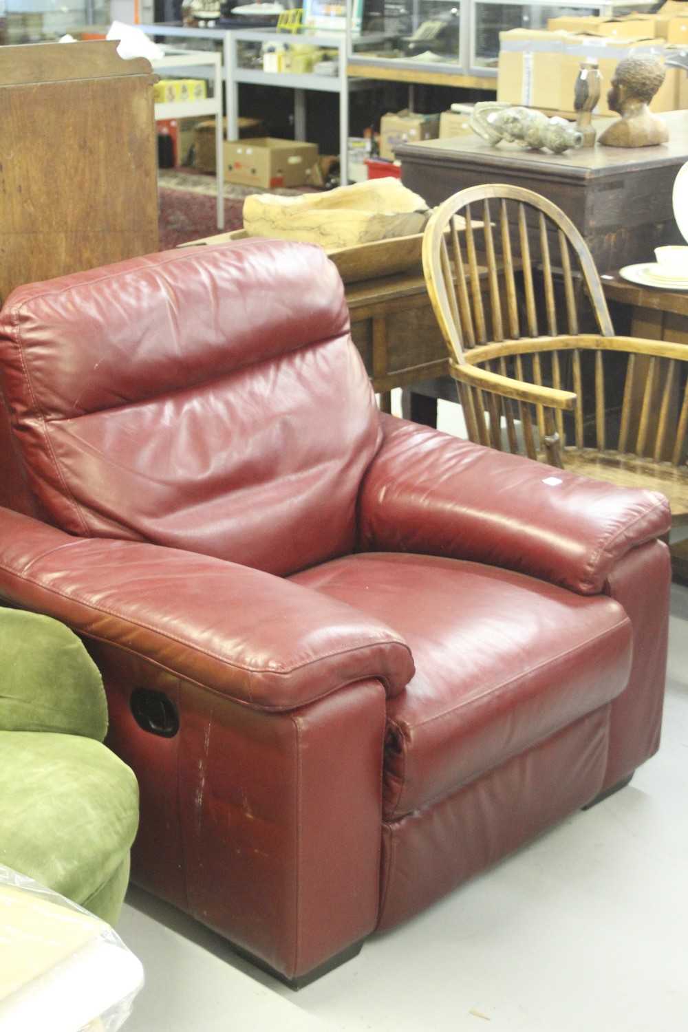 20th cent. Red leather reclining armchair.