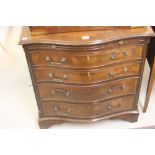 20th cent. Mahogany four drawer chest with brushing slide serpentine fronted on bracket supports.
