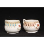WHITE STAR LINE: Wisteria tea cups in turquoise and gilt and brown and gilt. (2).