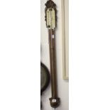 Early 20th cent. Oak stick barometer with carved foliate decoration.