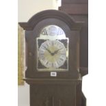 20th cent. Clocks: Walnut veneer Grandmother clock, German manufacture.