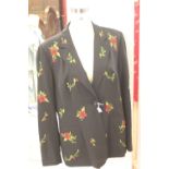 Fashion: Kaleidoscope label cocktail jacket, black with embroidered red flowers and green leaves,