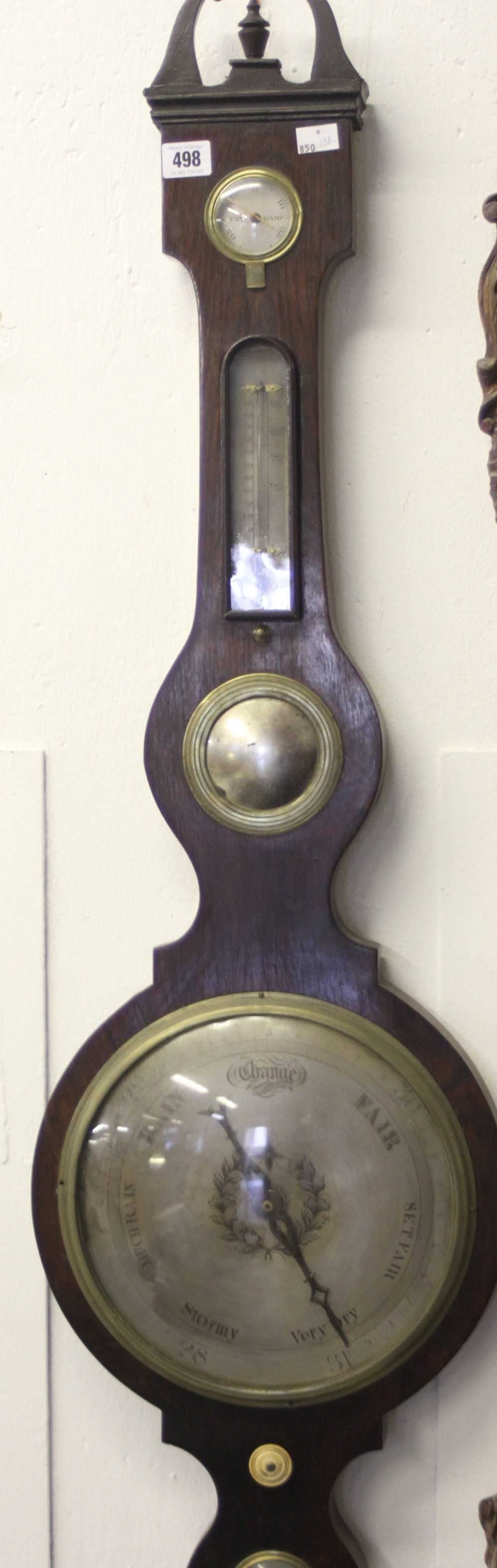 Scientific: 19th cent. Rosewood wheel barometer temperature, balance and pressure dials.
