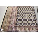 @21st cent. Rugs: Blue ground Bokhara carpet. 2.30 x 1.60.