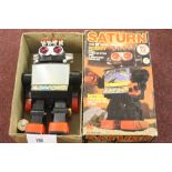 Toys: "Saturn" walking robot, light up eyes, shooting missiles TV screen, boxed. 13ins.