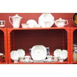 20th cent. Ceramics: Melba bone china, geometric art deco style tea set Reg No 778351 and Reg No 8,