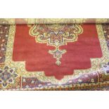 20th cent. Rugs: Modern weave rugs. Both red ground in an Indian style.