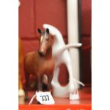 Royal Dux: Stylized white horse plus a Beswick Horse matt finish.