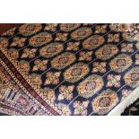 @21st cent. Rugs: Blue ground Bokhara carpet. 2.30 x 1.60.