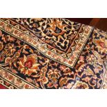 @21st cent. Rugs: Red ground Keshan carpet. 2.80 x 2.00.