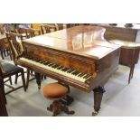 Ernst Kaps walnut baby grand piano, retailed by Charles Russell. 69ins. x 52ins. x 37ins.