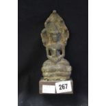 Oriental/ Far East: A Khmer bronze figure of a Buddha seated under multi headed mucalinda, the