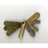 R.M.S. OLYMPIC: Rare bunch of brass key tags, reputed to have been acquired after Olympic was broken