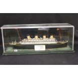 R.M.S. OLYMPIC: Scratch built model of the liner at sea in bespoke perspex case. 31ins. x 12ins.