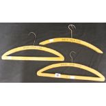 WHITE STAR LINE: Three treen coat hangers with impressed "White Star Line". 16ins.