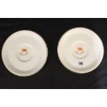 WHITE STAR LINE: Bouillon plates with White Star house flag to the centre and gilt rim - a pair. 7½