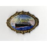 R.M.S. OLYMPIC: Unusual oval gilt enamel brooch showing "H.M.S Olympic" at sea. 1½ins.