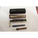 Pens: Conway Stewart 27, purple red body, gilt fittings, 14ct. nib, with box and guarantee, Kingwood