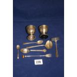 Hallmarked Silver: Egg cups, spoons, pickle fork, pusher & tot ladle. 3ozs.