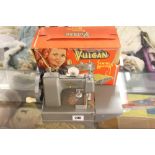 Toys: Vulcan sewing machine, boxed. (Box a/f.).