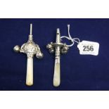 Hallmarked Silver: Baby whistle/rattle (4 bells) and mother of pearl teething handle plus one