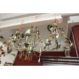 Lighting: Contemporary chandelier, six branch ceiling lights anodised with amber coloured