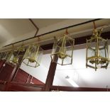 20th cent. Lighting: Four matching three bulb hanging lanterns 15½ ins. plus a 12½ lantern with