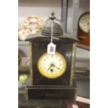 19th cent. Black slate clock with marble inlay and French movement.
