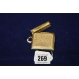 Hallmarked Gold: 9ct. Vesta with engine turned decoration. 28grams.