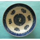 George III: a good pearlware bowl of large size printed in blue, the exterior with Chinese