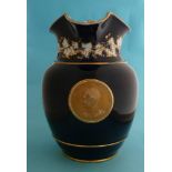 George IV: a large cobalt blue ground porcelain jug moulded with a gilded portrait medallion, 246mm,