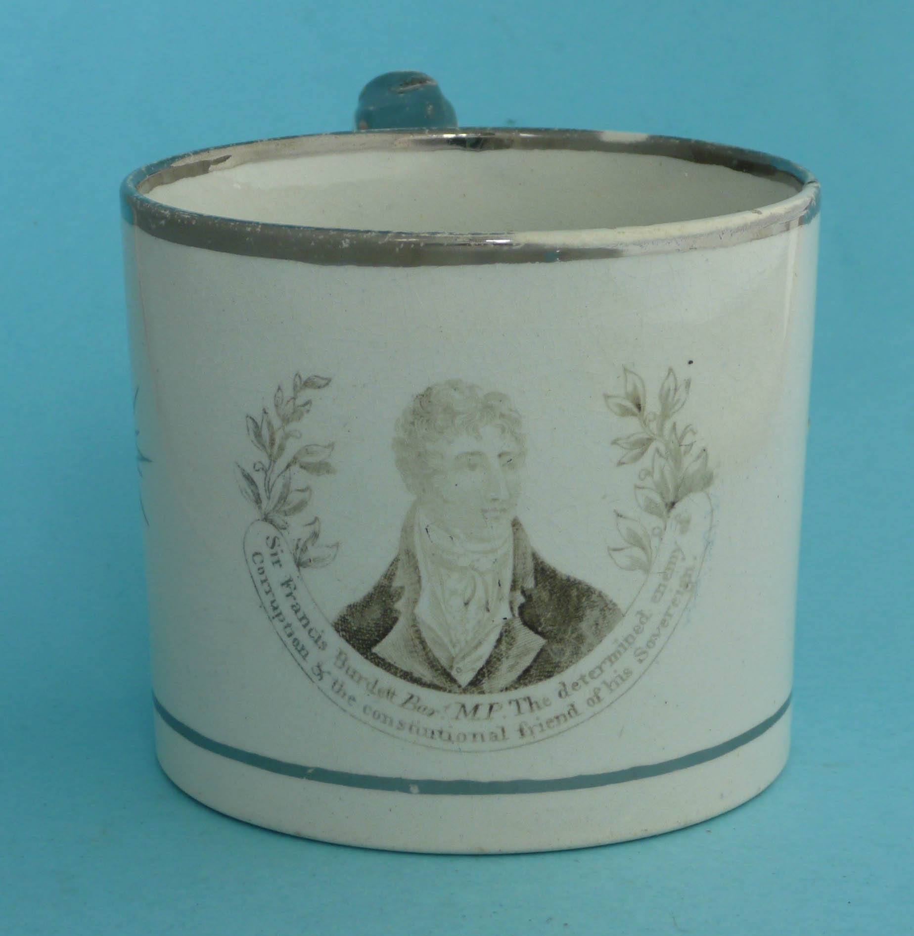 Sir Francis Burdett: a cylindrical pearlware mug decorated in silver lustre and printed in grey with