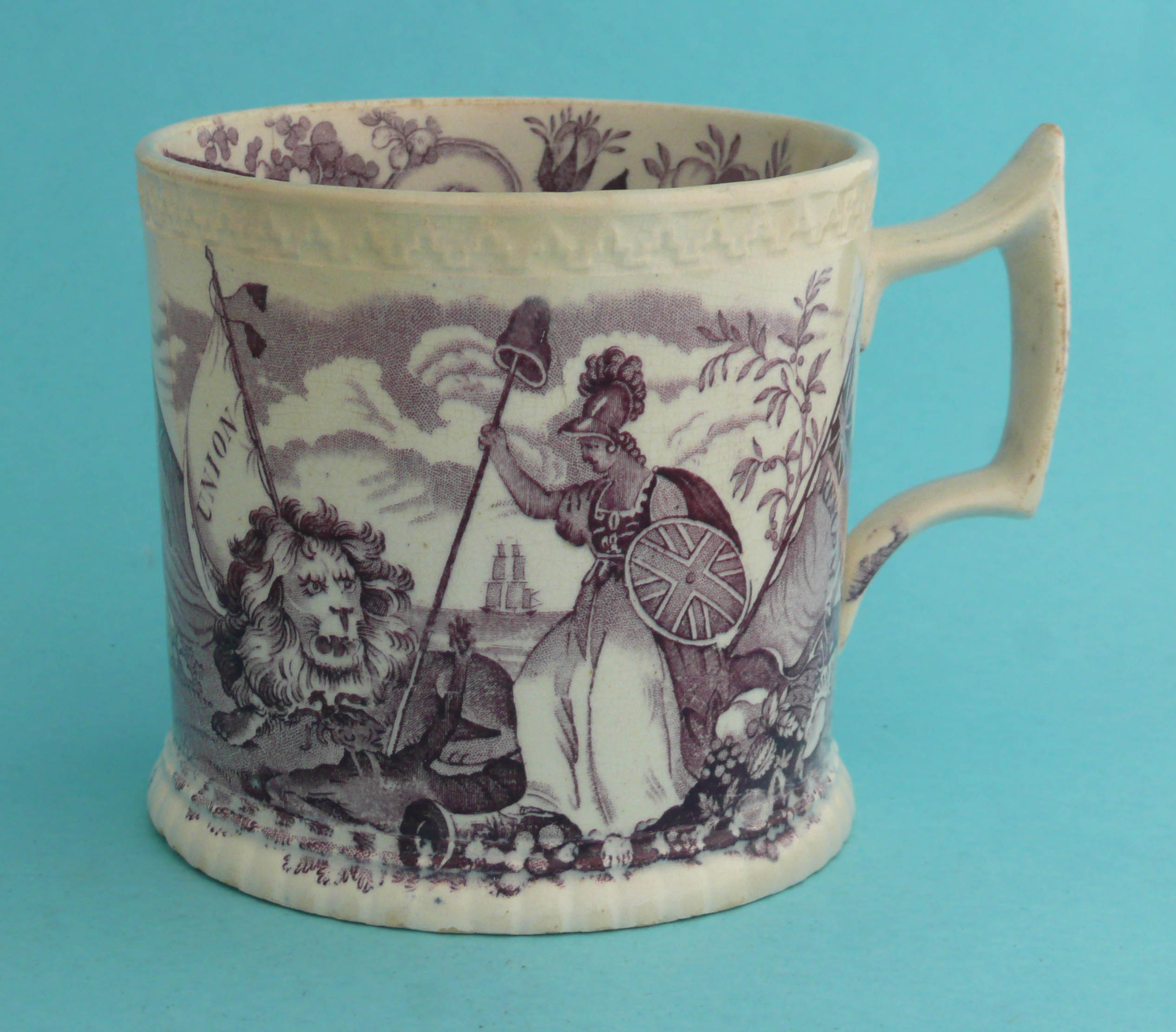 1832 Reform: a cylindrical pottery mug, the interior modelled with a colourful frog, printed in