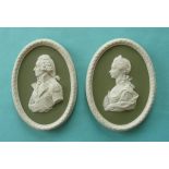 A pair of 20th century Wedgwood green jasperware portrait medallions depicting Lord Nelson and Queen