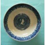 George III: a pearlware bowl printed in blue the exterior with Chinese landscapes, the interior with