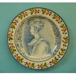 Queen Caroline: a pottery nursery plate the moulded border decorated in colours and printed in