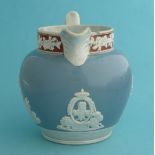 1817 Charlotte in memoriam: a pearlware jug the pale blue ground moulded with scenes in white, 112mm