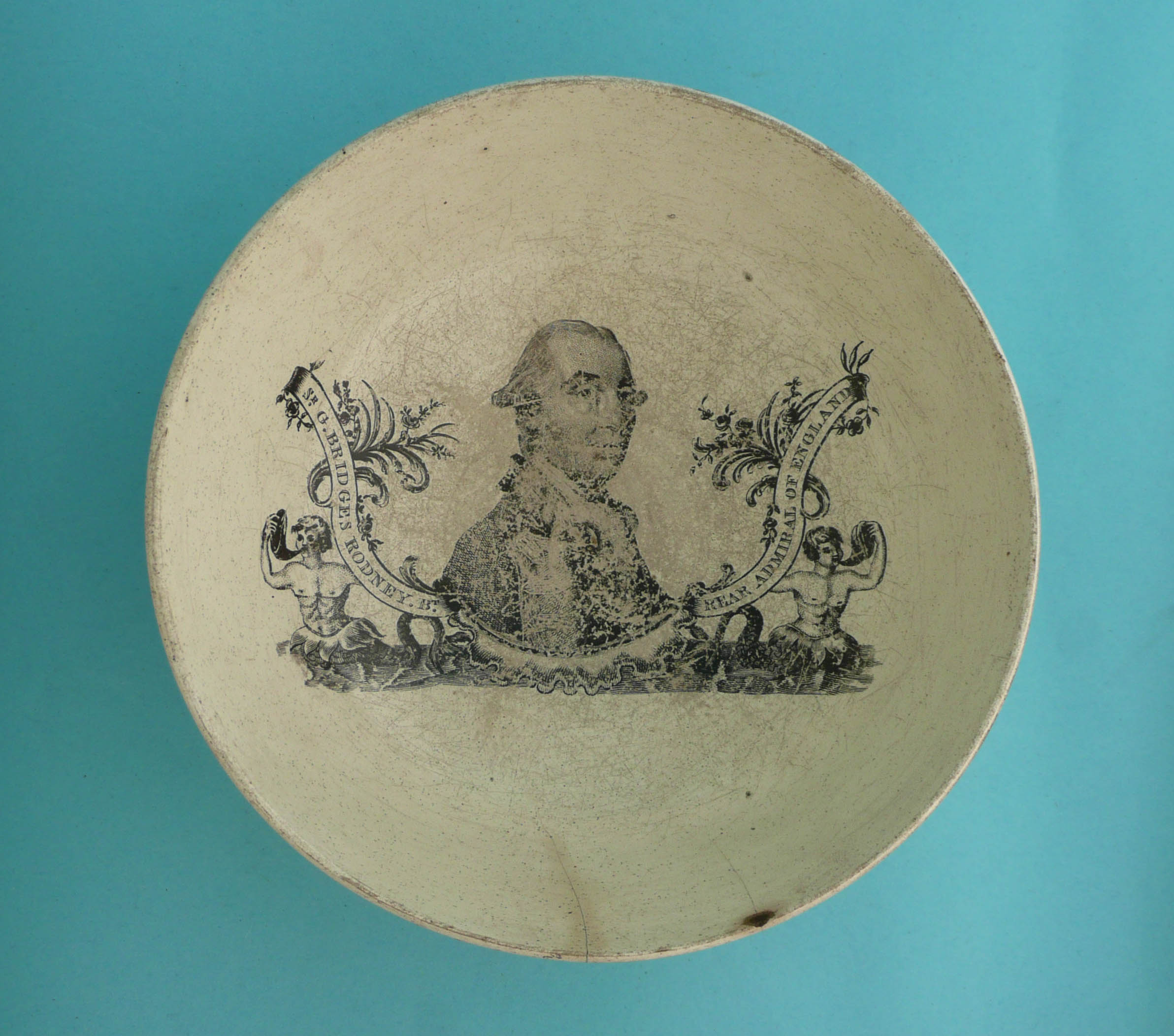 Admiral Sir G. Bridges Rodney: a creamware bowl printed in black with a named portrait and on the